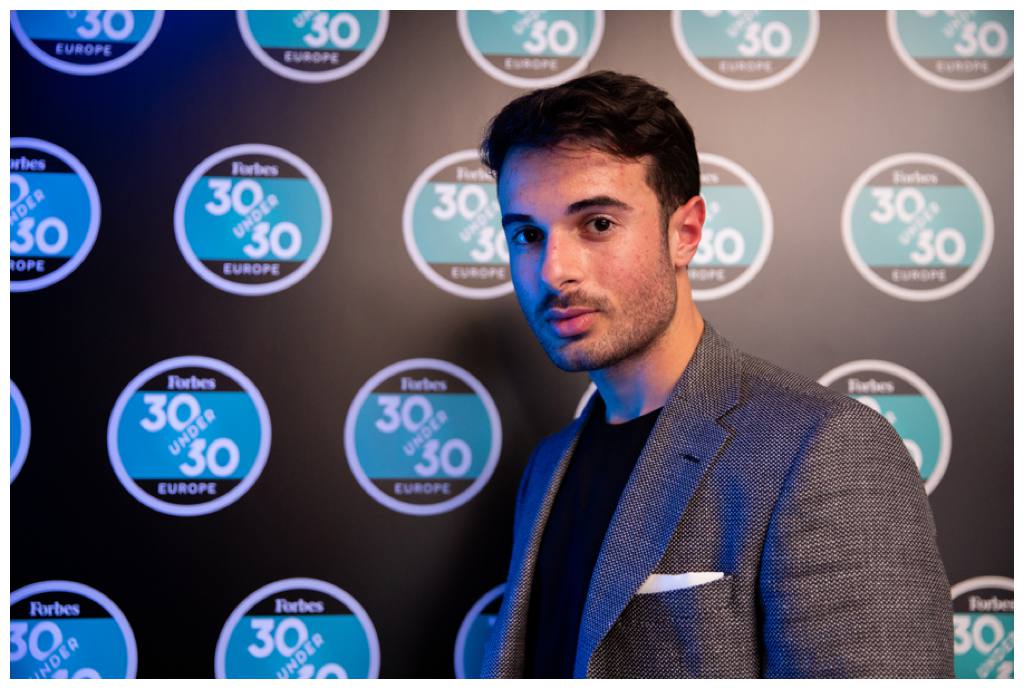 Forbes 30 under 30 guest at corporate party