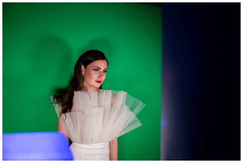 lady posing in photo booth at Forbes 30 under 30 corporate party