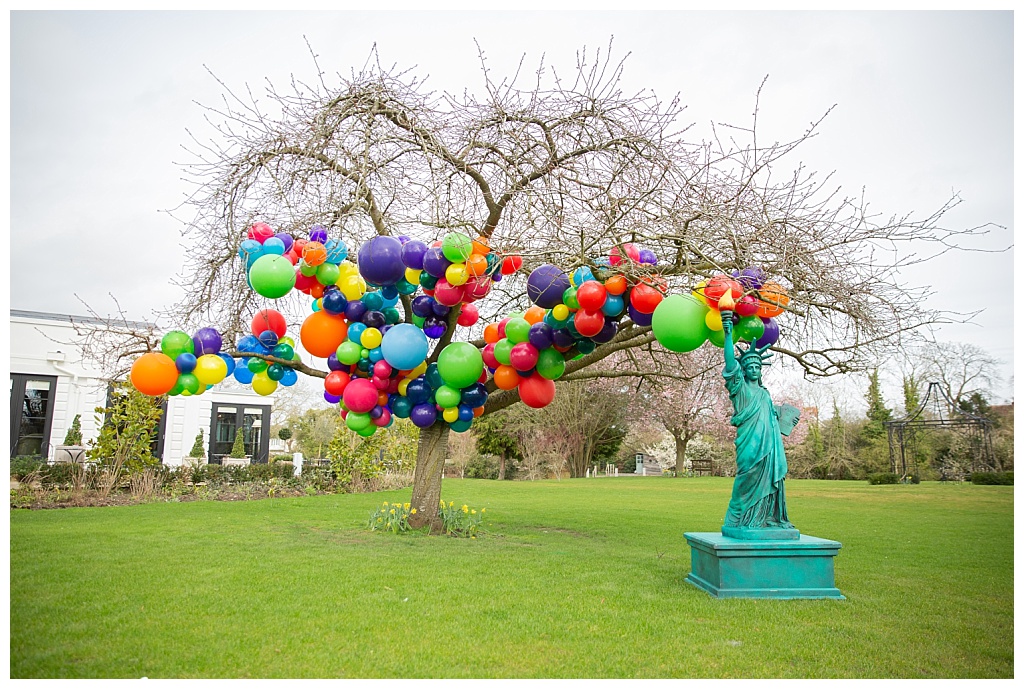 Balloon installation in tree by Bubblegum Balloons