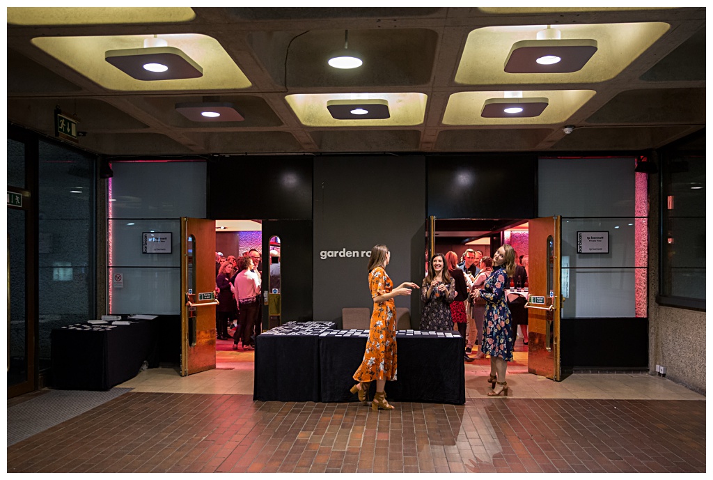 Creative shot of event organisers at the Garden Room event space at the Barbican