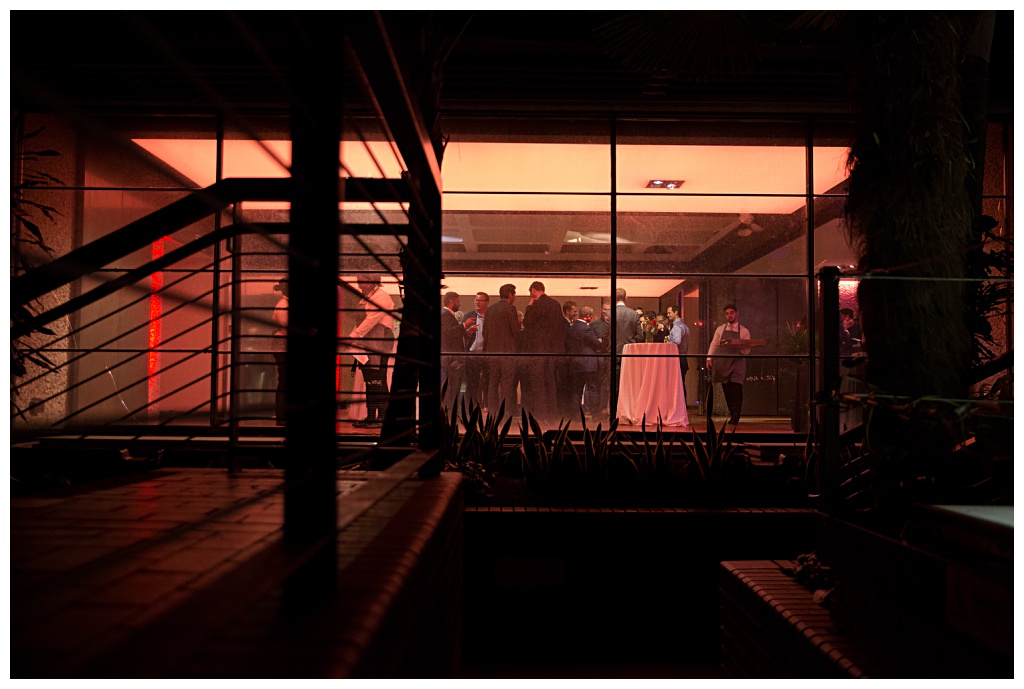 Cool event photography shot of the Barbican event space from the outside looking in 