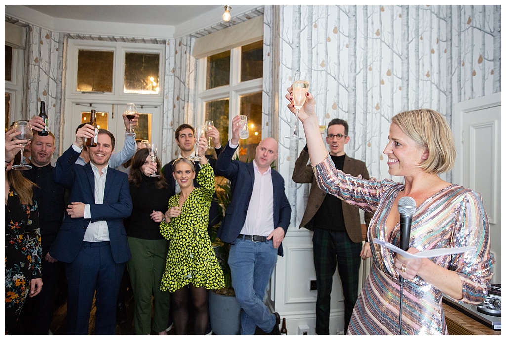 Guests toasting at The House of St Barnabas