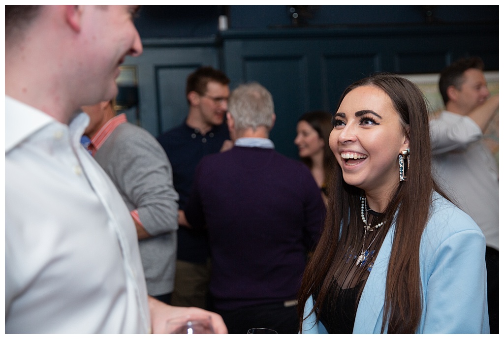 Woman laughing at party