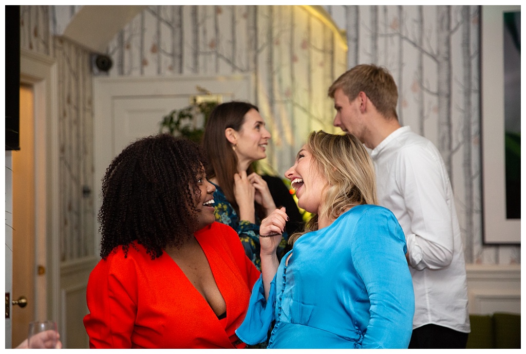 Two women laughing on the dancefloor